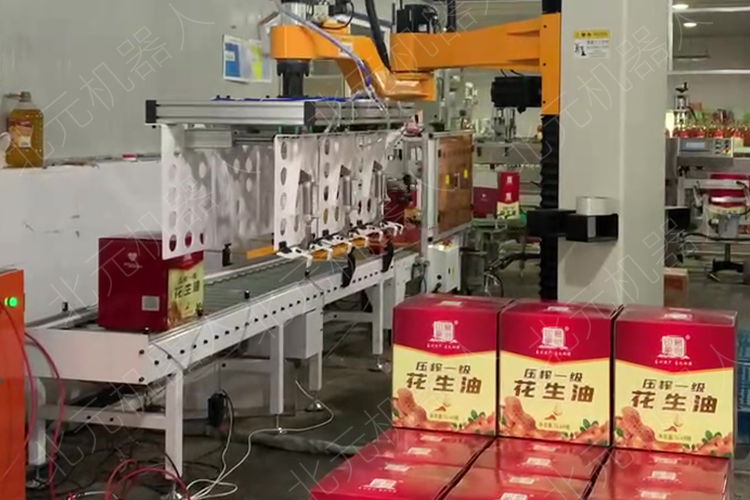 花生油自動(dòng)碼垛機(jī)，箱裝物料堆垛